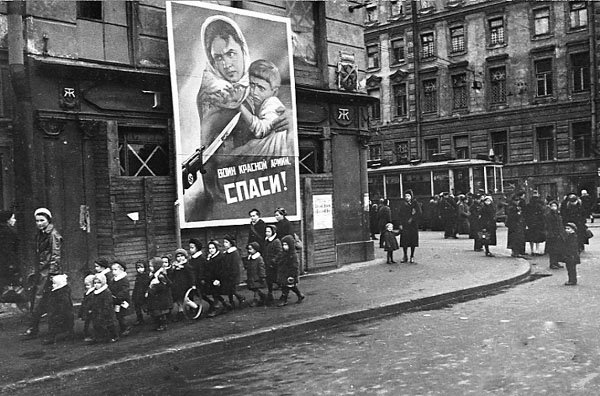 A huge banner is asking Soviet soldiers to save children of Leningrad
