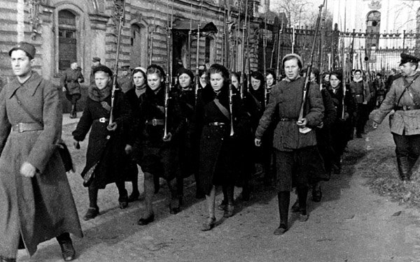 1942. When almost every man left to war, women took rifles too.